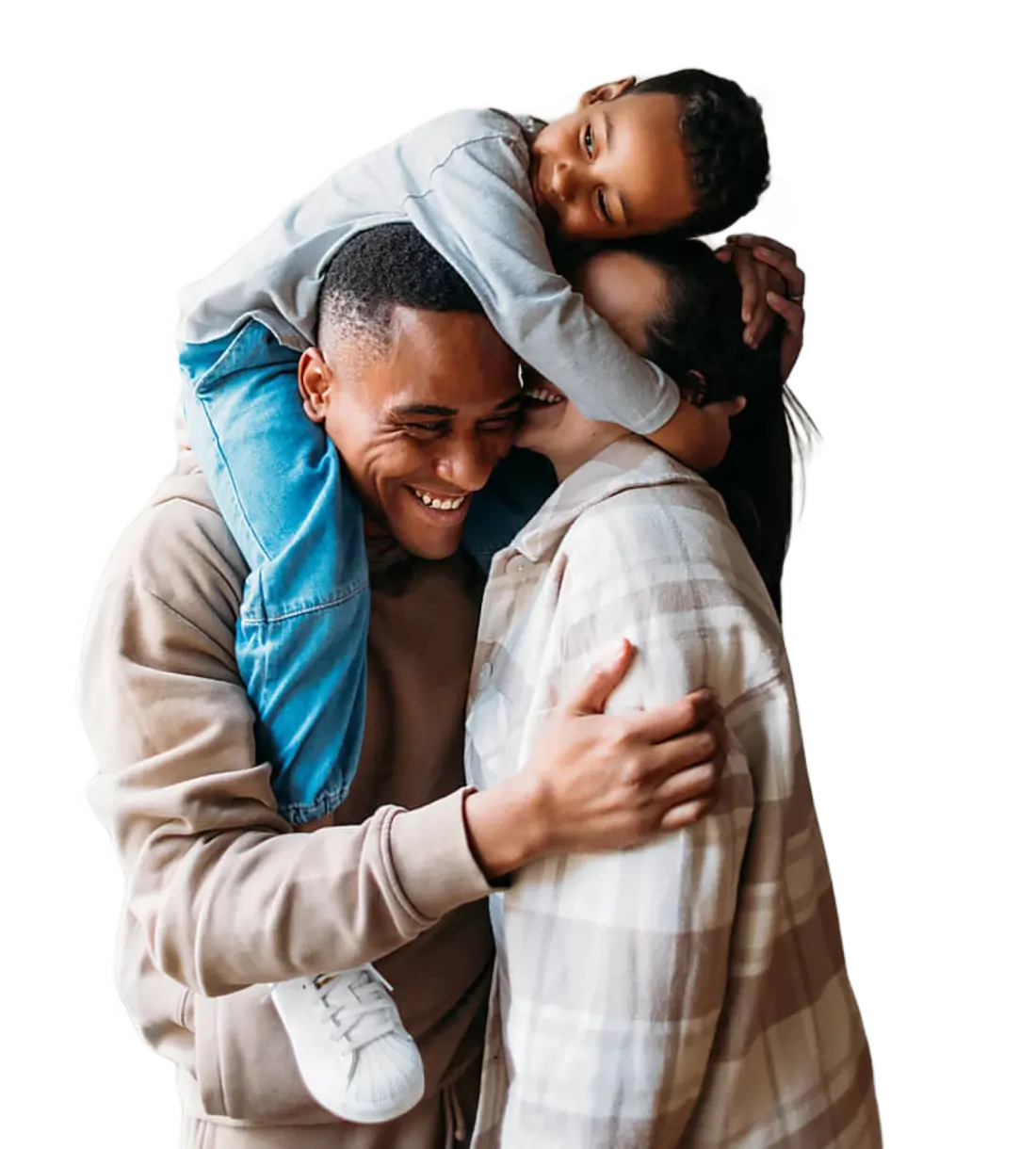 A smiling family embracing